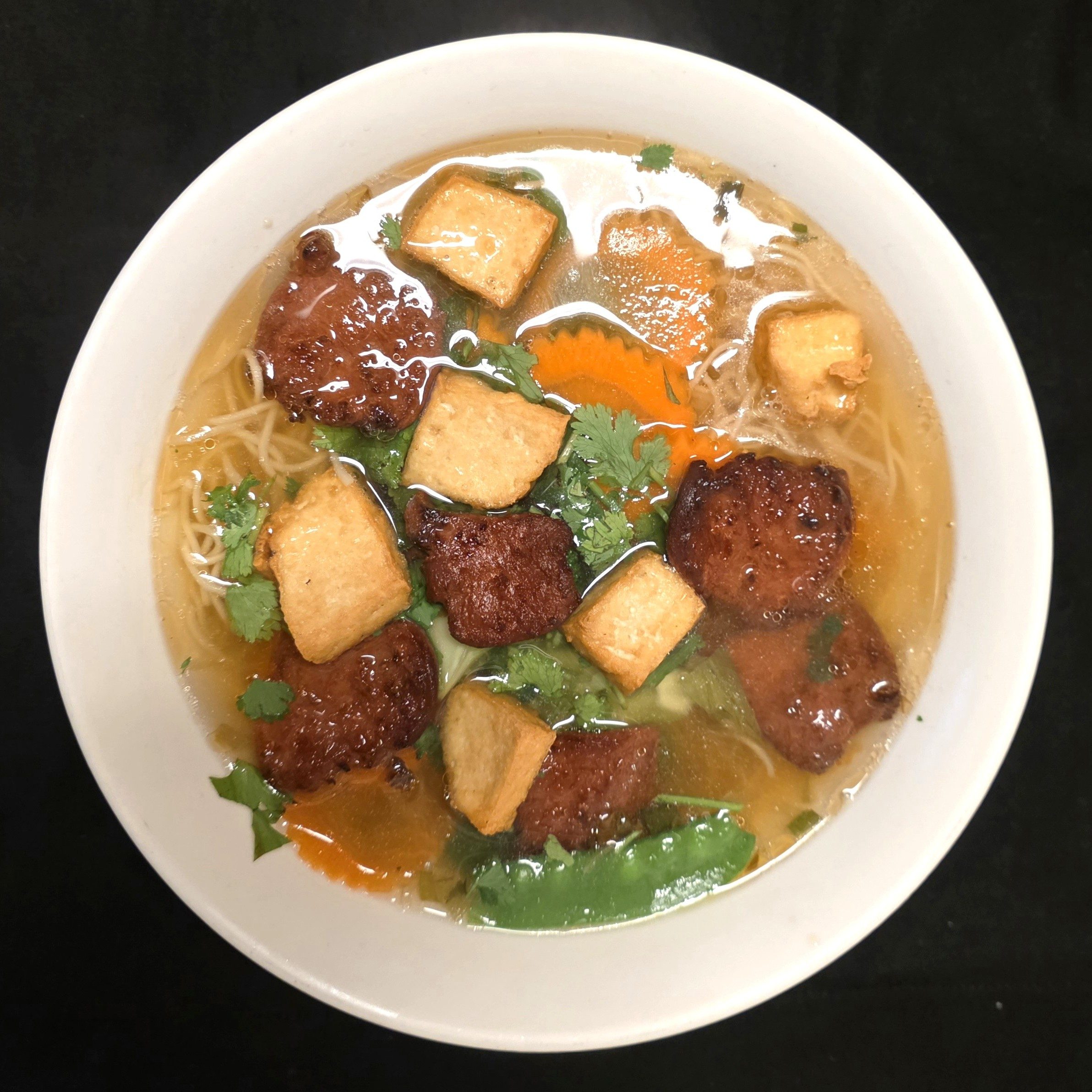 Yellow Noodle Soup with Grilled Pork.